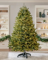 Árvore de Natal Verde Premium com Galhos Articulados, Suporte Metálico que gira e com Rodinhas e Micro LEDs Embutidos